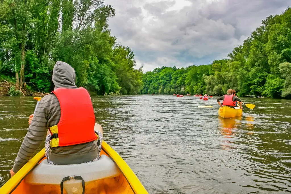 Tourists kayaking on river Dordogne in France